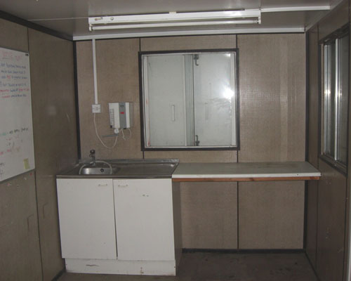 view of the kitchen sink area in the portable office / canteen
