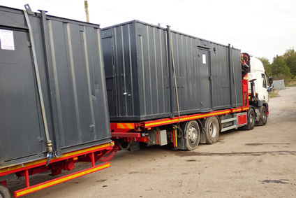 2 shipping containers in transit